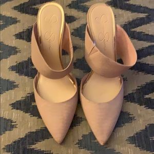 Jessica Simpson cream snake skin print mules.